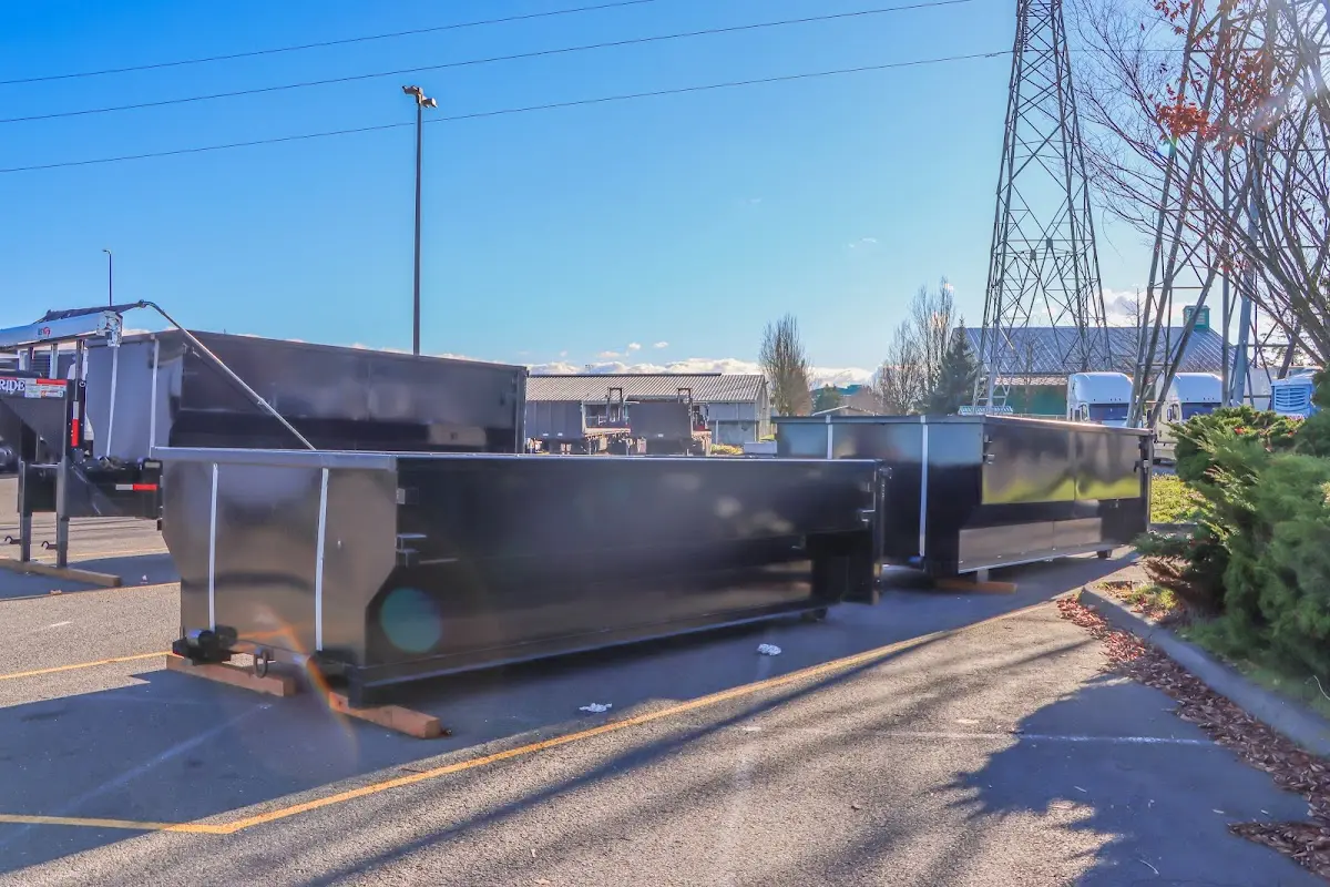 Roll-off dumpster ready for waste disposal at job site for 3 Yard Dumpster Rental in Sudbury